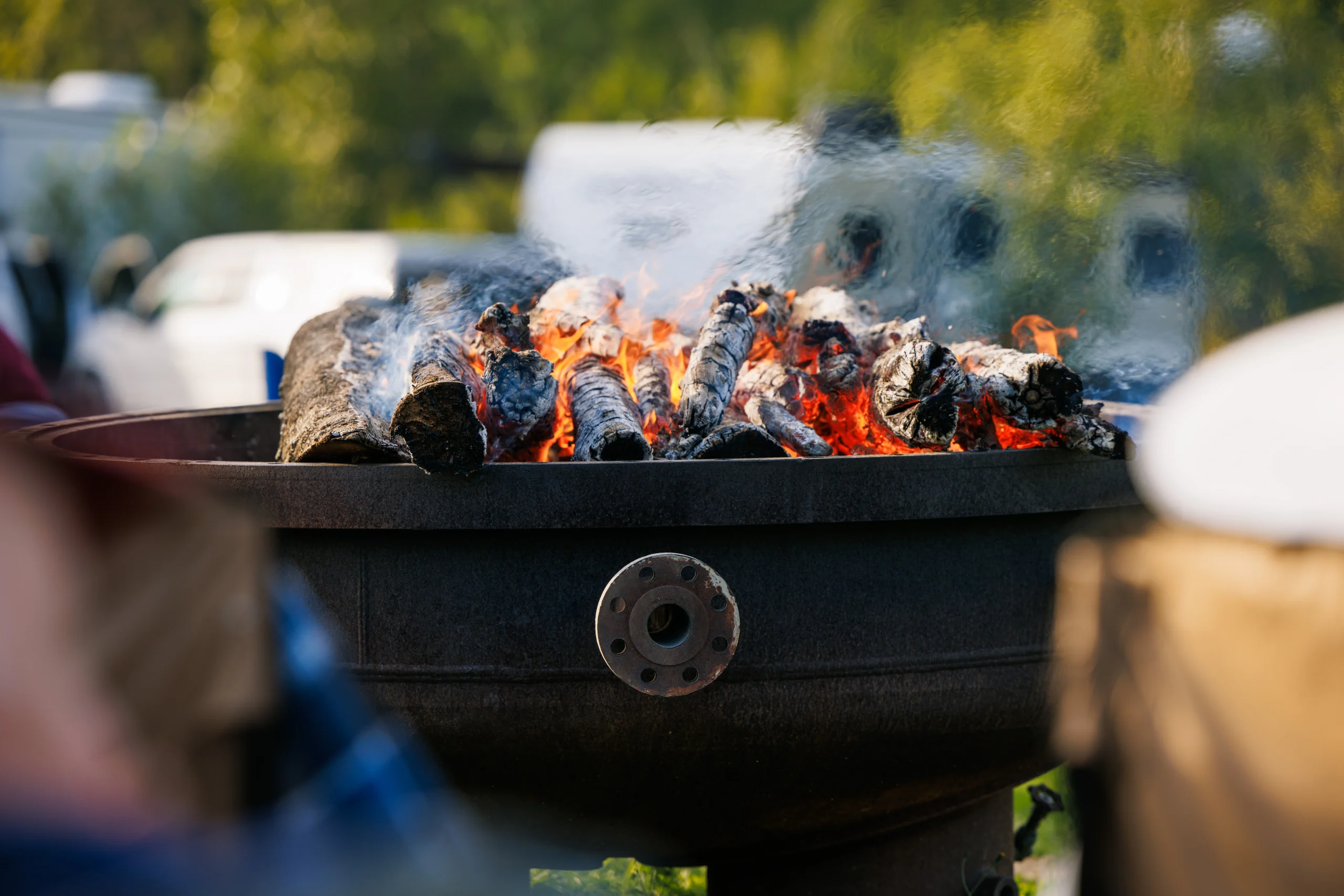 Fire burning in an outdoor fire pit at Diamond M Ranch Resort